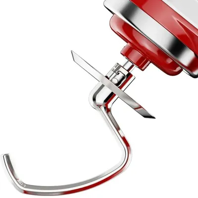 A close-up view of a red and silver stand mixer attachment, specifically a dough hook and beater, against a white background.
