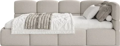 A top-down view of a bed with bedding and pillows.