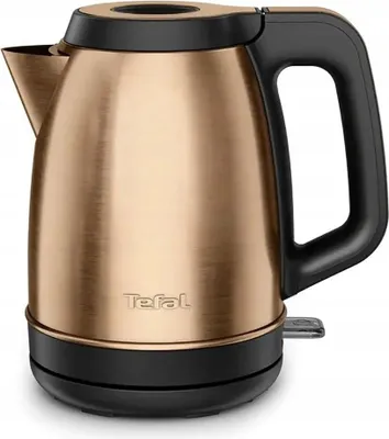 A studio shot of a copper and black electric kettle.