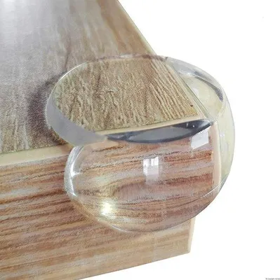 Produktbild von Unyqoos® Transparenter Eckenschutz für Möbel & Tische – PVC, selbstklebend, kindersicher, geruchlos, für Holz/Glas/Kunststoff/Metall/Keramik