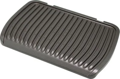A close-up, top-down view of a grill plate.