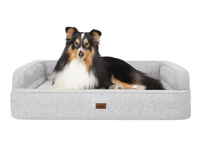 Imagen del producto de Cama para perros PARADISE (96x62 cm), sofá cómodo para perros con laterales altos y funda desmontable – Doggy