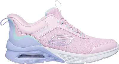 A side view of a single pink sneaker with iridescent accents.
