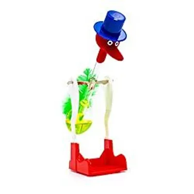 A toy bird with a top hat on a white background.