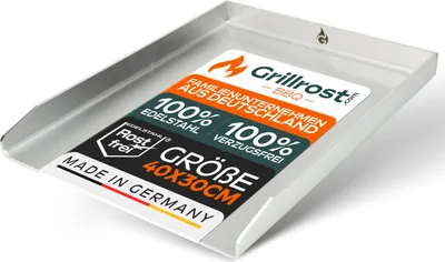 A metal grill plate with a sticker showing product information.
