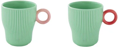 Imagen del producto de Juego de dos tazas de porcelana Twist & Match, color aguamarina y rosa