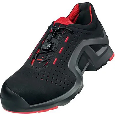 A single black and red safety shoe is shown against a white background.