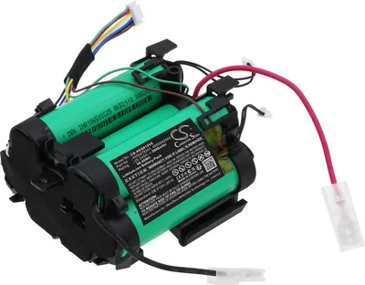 A close-up view of a battery pack with multiple green cells and black connectors.