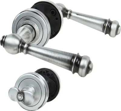 A set of door handles and a privacy lock, presented against a white background.