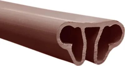 A close-up, cutaway view of a brown plastic profile rail.