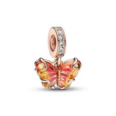 A close-up studio shot of a Pandora charm shaped like a butterfly.