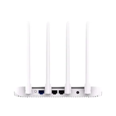 The back view of a white Xiaomi router with four antennas and several ports.