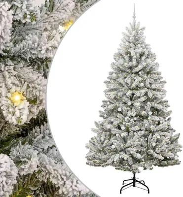 A flocked artificial Christmas tree with lights on a white background.