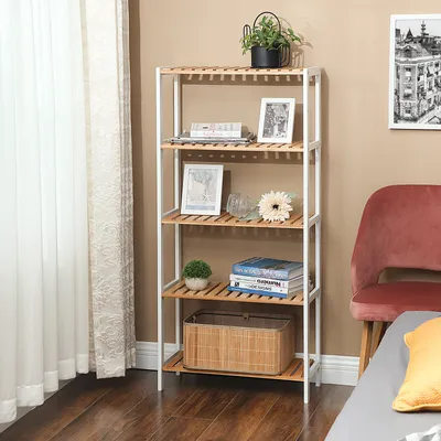 A shelving unit is displayed in a room with a chair and curtains.