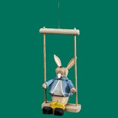 Produktbild von Osterdekoration Osterhasenkind auf Schaukel geschnitzt Höhe 10cm NEU