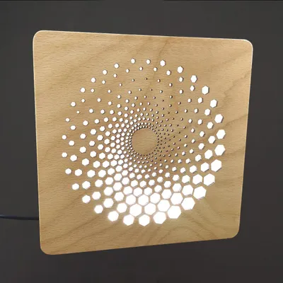 Produktbild von Holzlampe mit Spiralmotiv, Größe 20 cm, mit LED-Beleuchtung mit