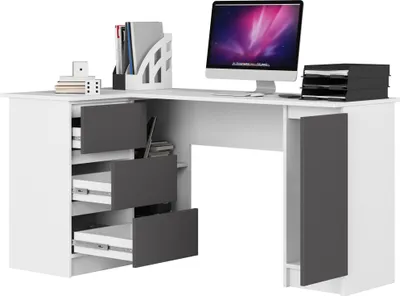 A corner desk with a computer, stationery, and storage compartments.