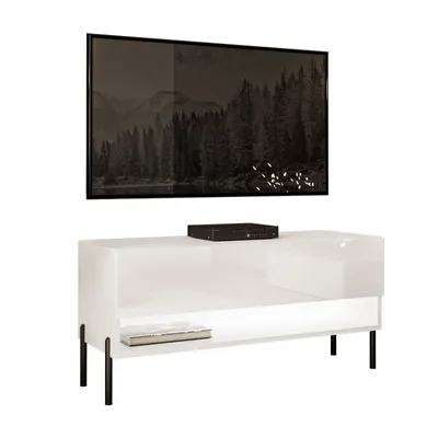 A white high-gloss TV stand with black legs is shown against a white background, with a television mounted above it.
