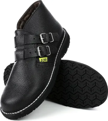 A pair of black leather boots with buckles and a white stitched sole, shown against a white background.