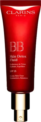 A red tube of Clarins BB Skin Detox Fluid with a gold pump dispenser.