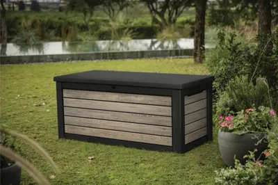 Produktbild von Aufbewahrungsbox, Kissenbox Keter Ashwood 630 L inkl. Gasdruckfedern 155 x 68,2 x 69,5 cm Holzoptik anthrazit/braun