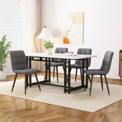 A dining room scene with a table and chairs.