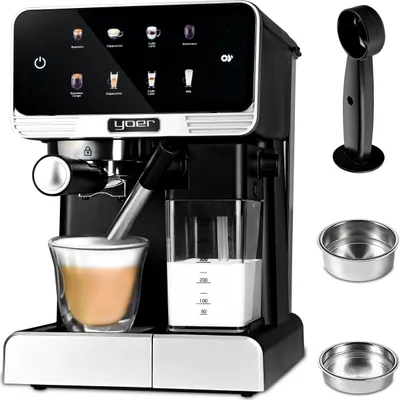 A black and silver automatic coffee machine with a glass cup of coffee and a milk carafe, along with accessories, displayed against a white background.