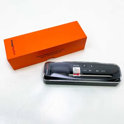 Product shot of a thermometer and its box.