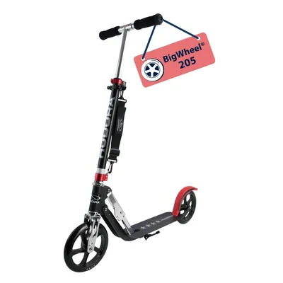 A black and red scooter with a pink tag attached to the handlebars.