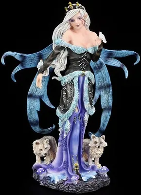 A figurine of a fairy queen with wolves at her feet, set against a black background.