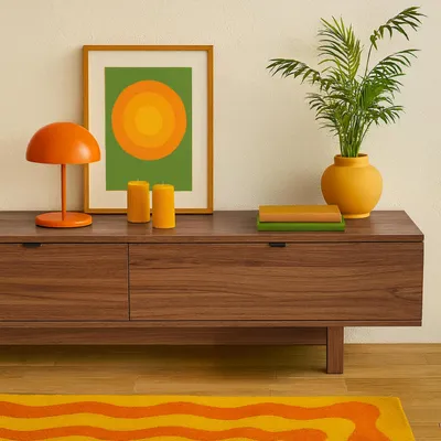 A TV cabinet with decorative items on top.
