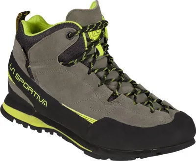 Zustiegsschuh "Boulder X Mid" von La Sportiva in Grau mit gelben Akzenten und Schnürung.