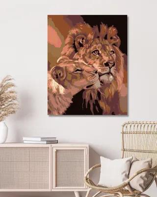 A painting of two lions is displayed on a wall above a cabinet and next to a chair.
