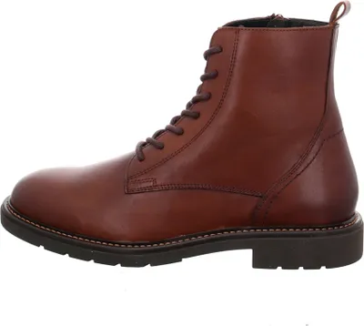 A side view of a brown leather boot.