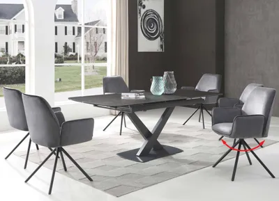 A dining room set with a table and chairs, set in a well-lit room with large windows.
