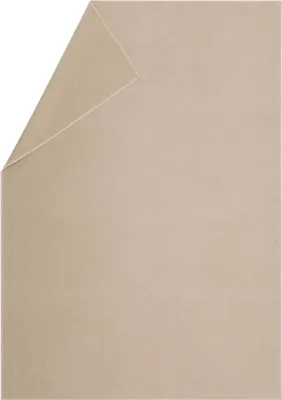 A beige blanket folded in the corner, showing its texture.