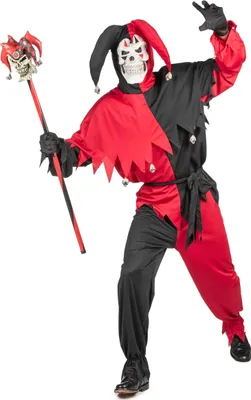 A person wearing a jester costume holding a staff.