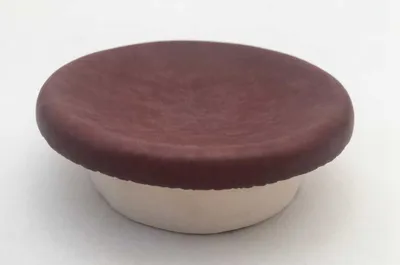 Produktbild von Putzdeckel Schlosskachel-Design havanna rund 13 cm