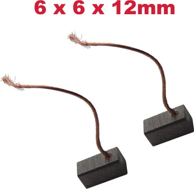 Two carbon brushes with attached wires on a white background.
