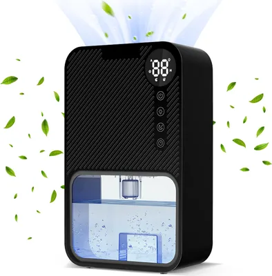 A black electric dehumidifier with a digital display and water tank is shown against a white background, with green leaves floating around it.