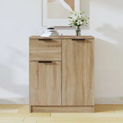 A wooden sideboard with two doors and two drawers in a room setting.