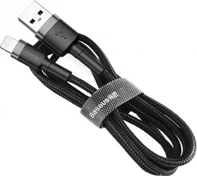 A black and gray USB to Lightning charging cable is coiled and secured with a strap.