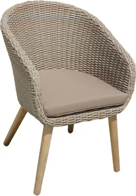A single wicker chair with a beige cushion and wooden legs, isolated on a white background.
