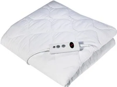 A folded white electric blanket with a control unit attached.