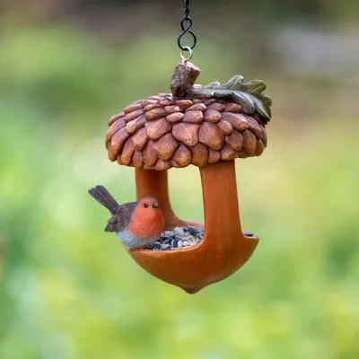 Produktbild von Eichelförmiges Vogelfutterhaus mit Rotkehlchenfigur