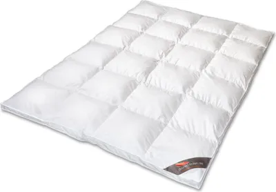 A white down comforter is laid out flat on a white background.