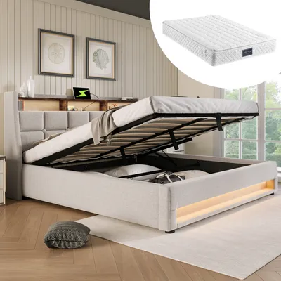 A bed with its storage compartment open, showing the mattress and interior space. The room has a modern, cozy aesthetic with wall paneling and artwork.