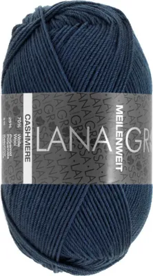 A ball of dark blue yarn with a label wrapped around it.
