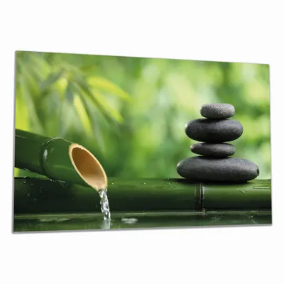 Produktbild von Wallario Herdabdeckplatte aus Glas, Größe 90 x 52 cm 1-teilig, Motiv Steinstapel und Bambus auf dem Wasser