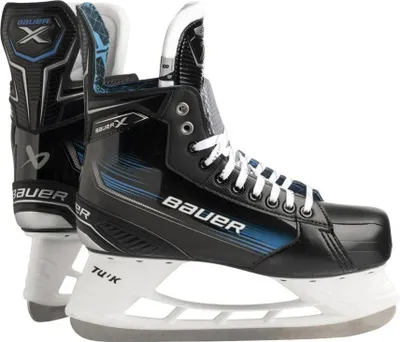 A pair of black Bauer X ice hockey skates with blue accents, shown from a side-angle on a white background.